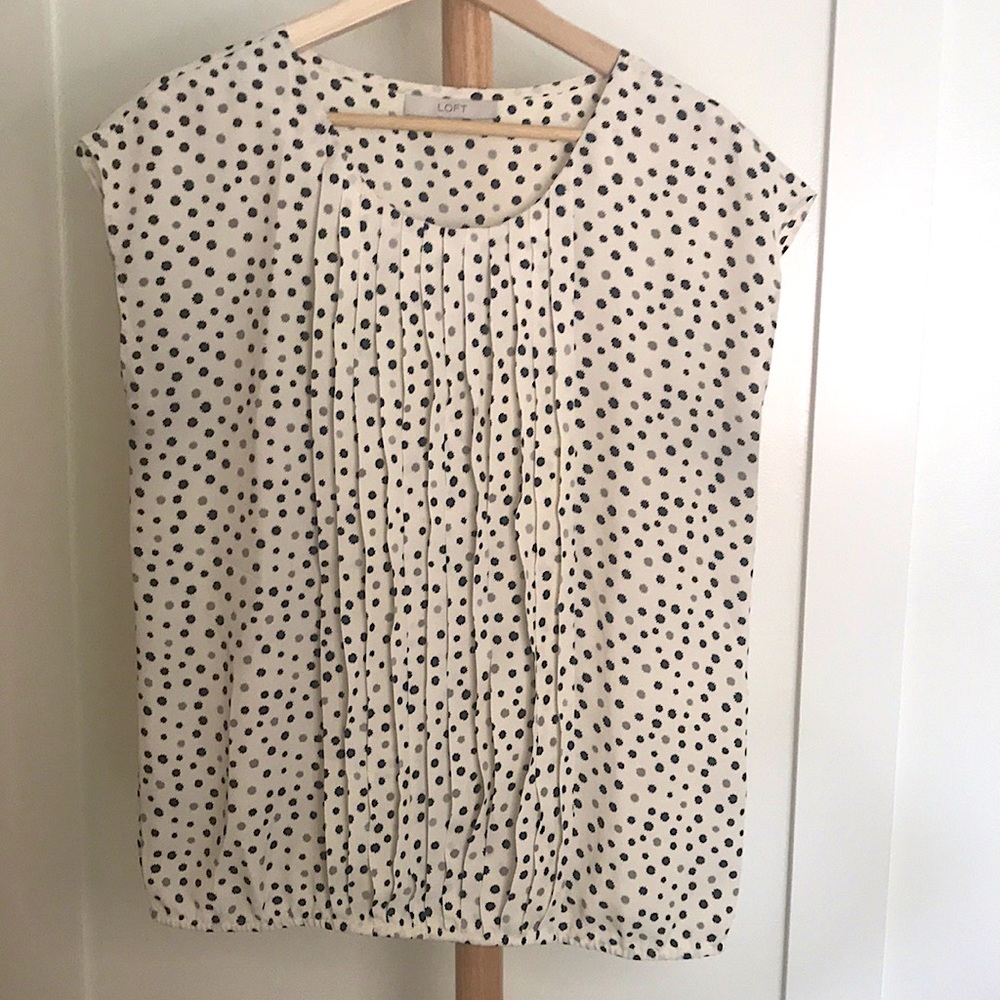 Loft cap-sleeve blouse with elastic hem. Size M